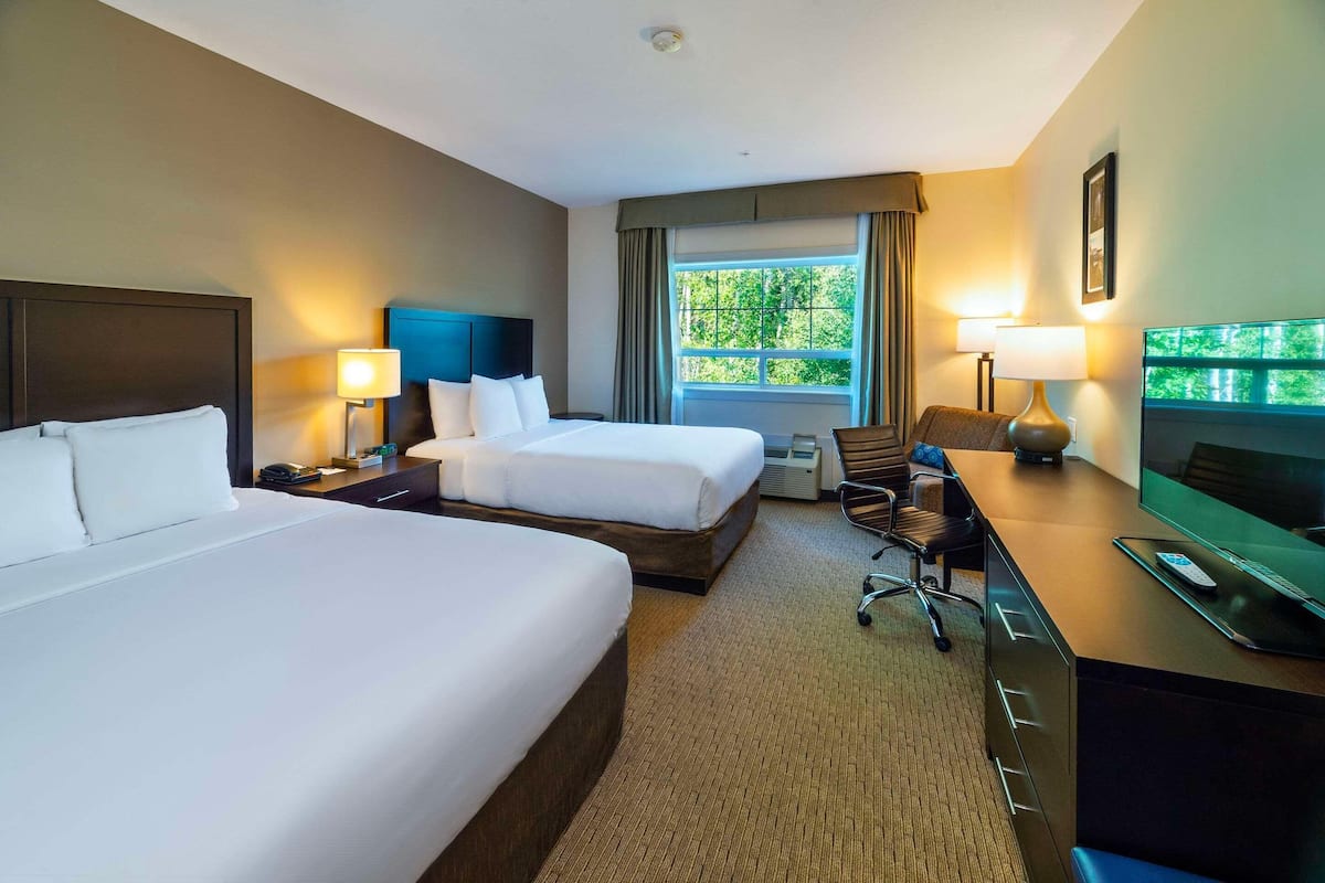 Pillow-top beds, desk, laptop workspace, blackout curtains