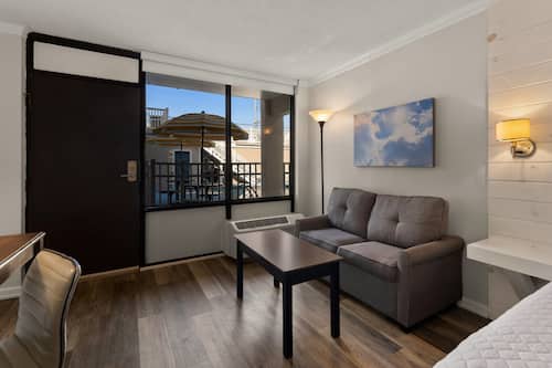 Atlantic Oceanside Deluxe King Bed Room | Individually furnished, desk, laptop workspace, blackout curtains