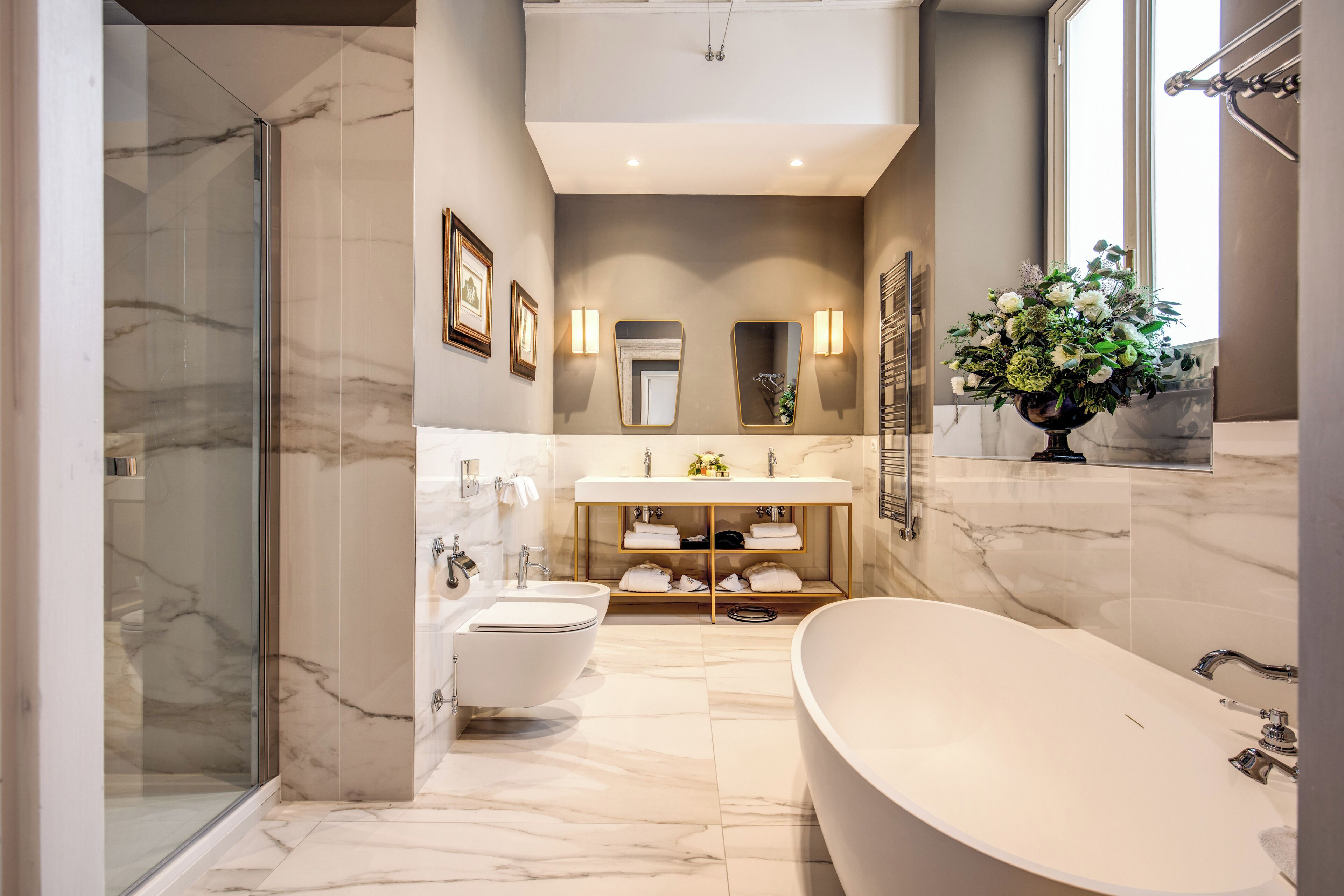 designer toiletries, hair dryer, bathrobes, slippers