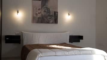 Comfort tweepersoonskamer, tuin | Luxe beddengoed, een minibar, een bureau, een strijkplank/strijkijzer