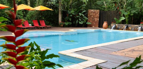 Outdoor pool, pool umbrellas, pool loungers