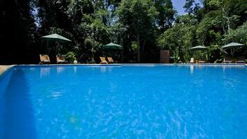 Outdoor pool, pool umbrellas, sun loungers