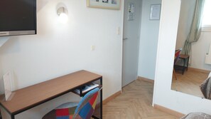 Desk, laptop workspace, free WiFi, bed sheets