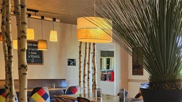 Breakfast, lunch, dinner served; local and international cuisine