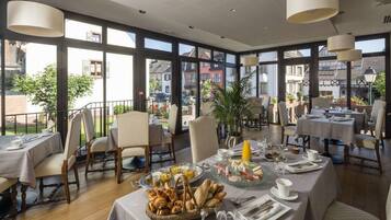 Daily buffet breakfast (EUR 23 per person)