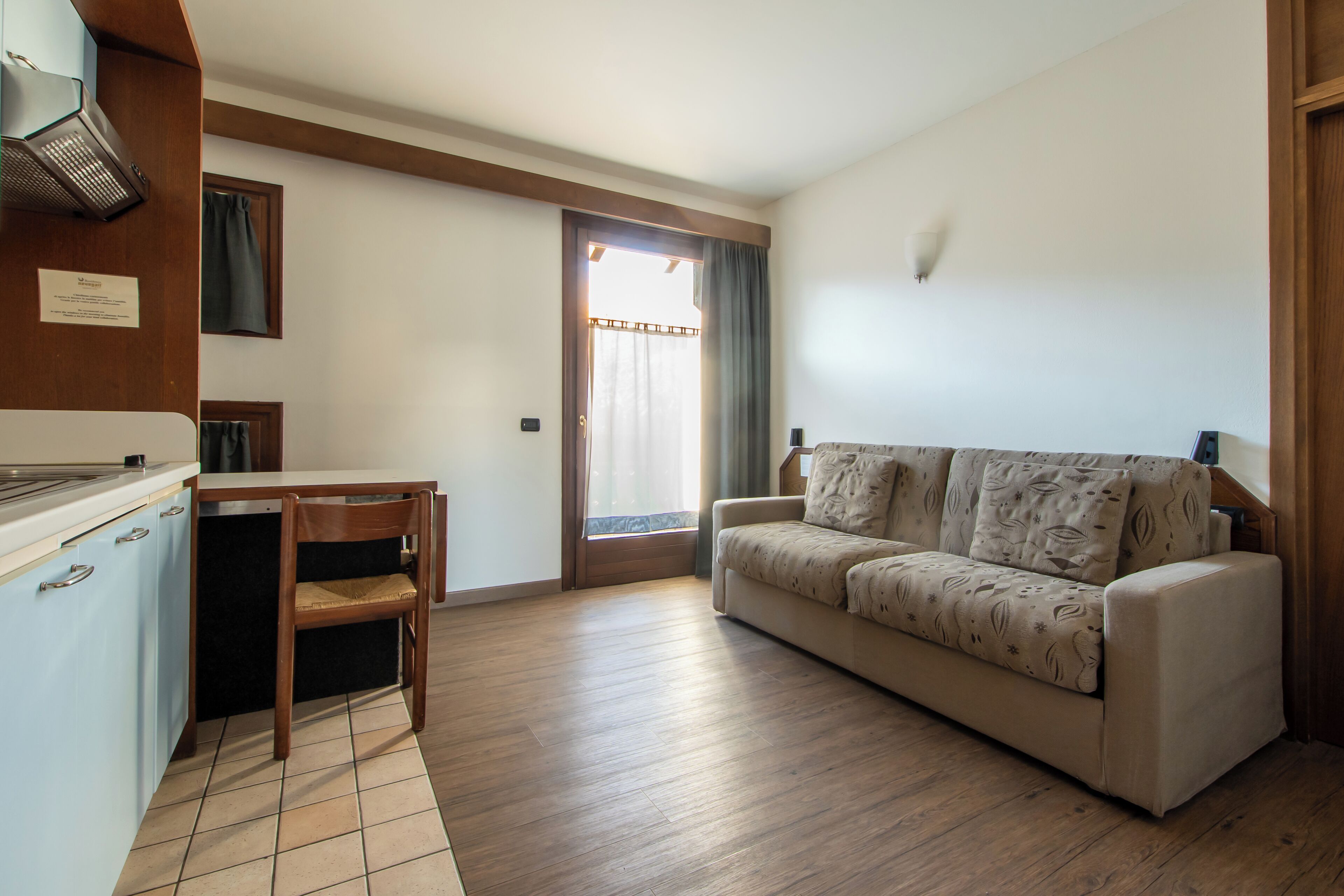 Appartement Confort, 1 chambre | Coin séjour | Télévision de 32 pouces avec chaînes par câble