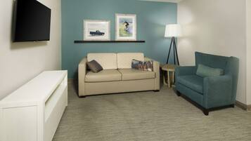 Studio Suite, 2 Queen Beds | Living area | 55-inch flat-screen TV with digital channels, TV, table tennis