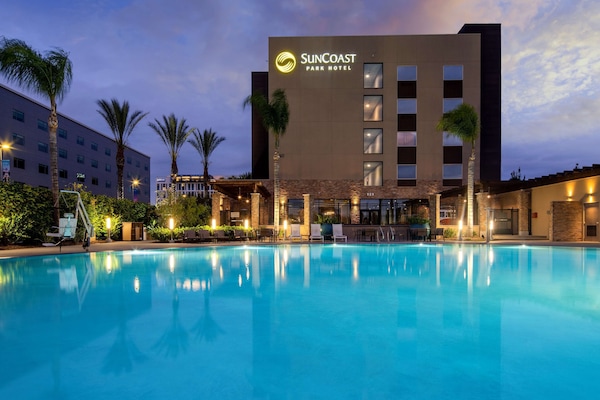Outdoor pool, a heated pool, open 8:00 AM to 10:00 PM, pool umbrellas