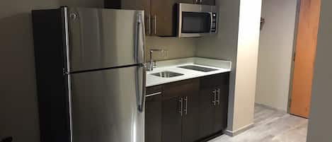 Seprai premium, meja kerja, tempat tidur bayi gratis, dan Wi-Fi gratis