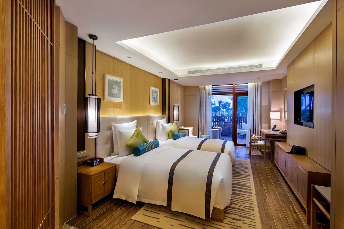 Premium bedding, down comforters, pillowtop beds, minibar