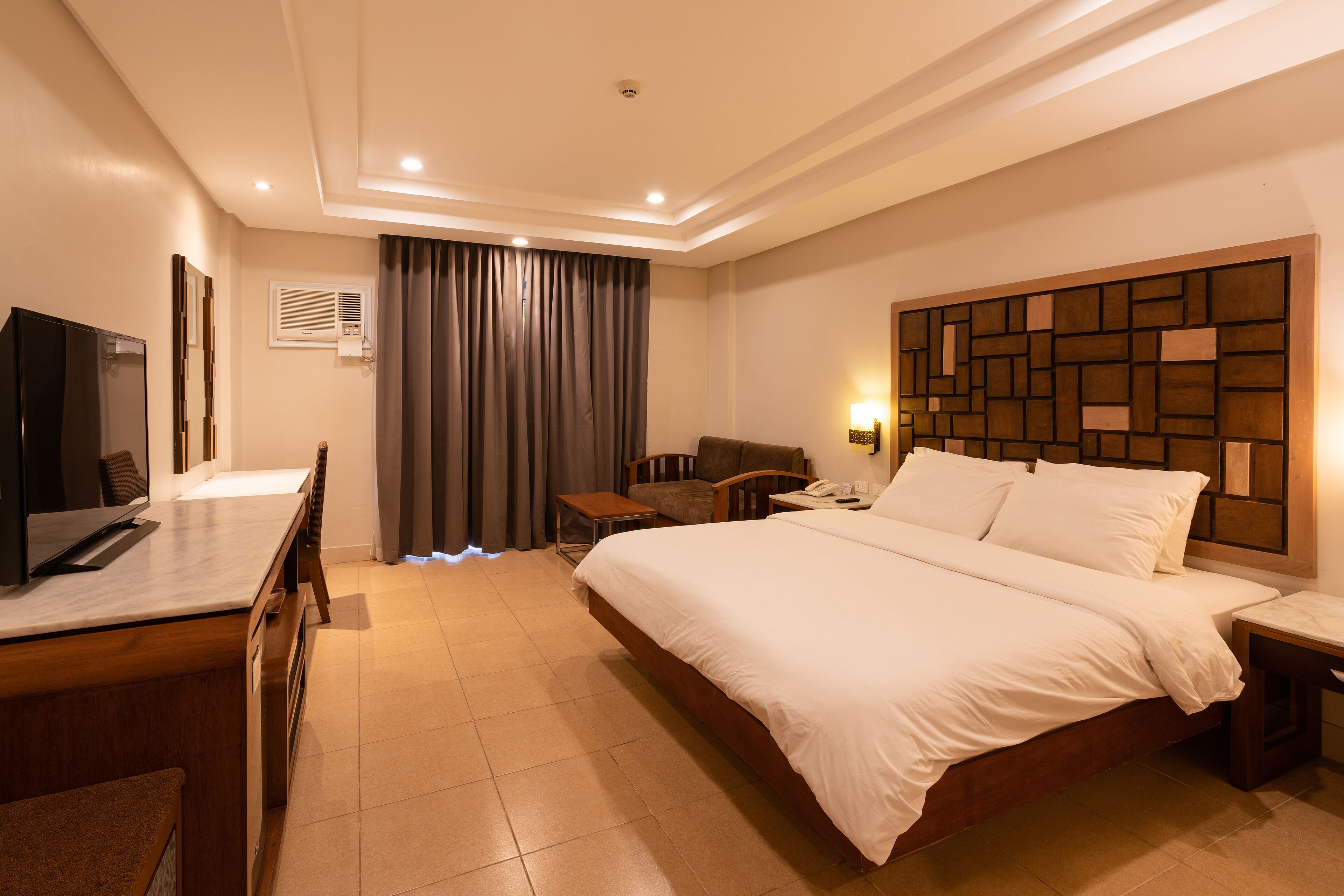 deluxe room, 1 bedroom, pool view | 1 bedroom, in-room safe, desk, blackout curtains