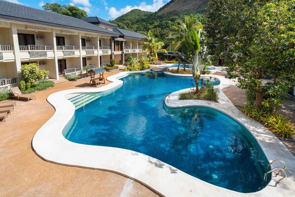 Outdoor pool, pool umbrellas, pool loungers