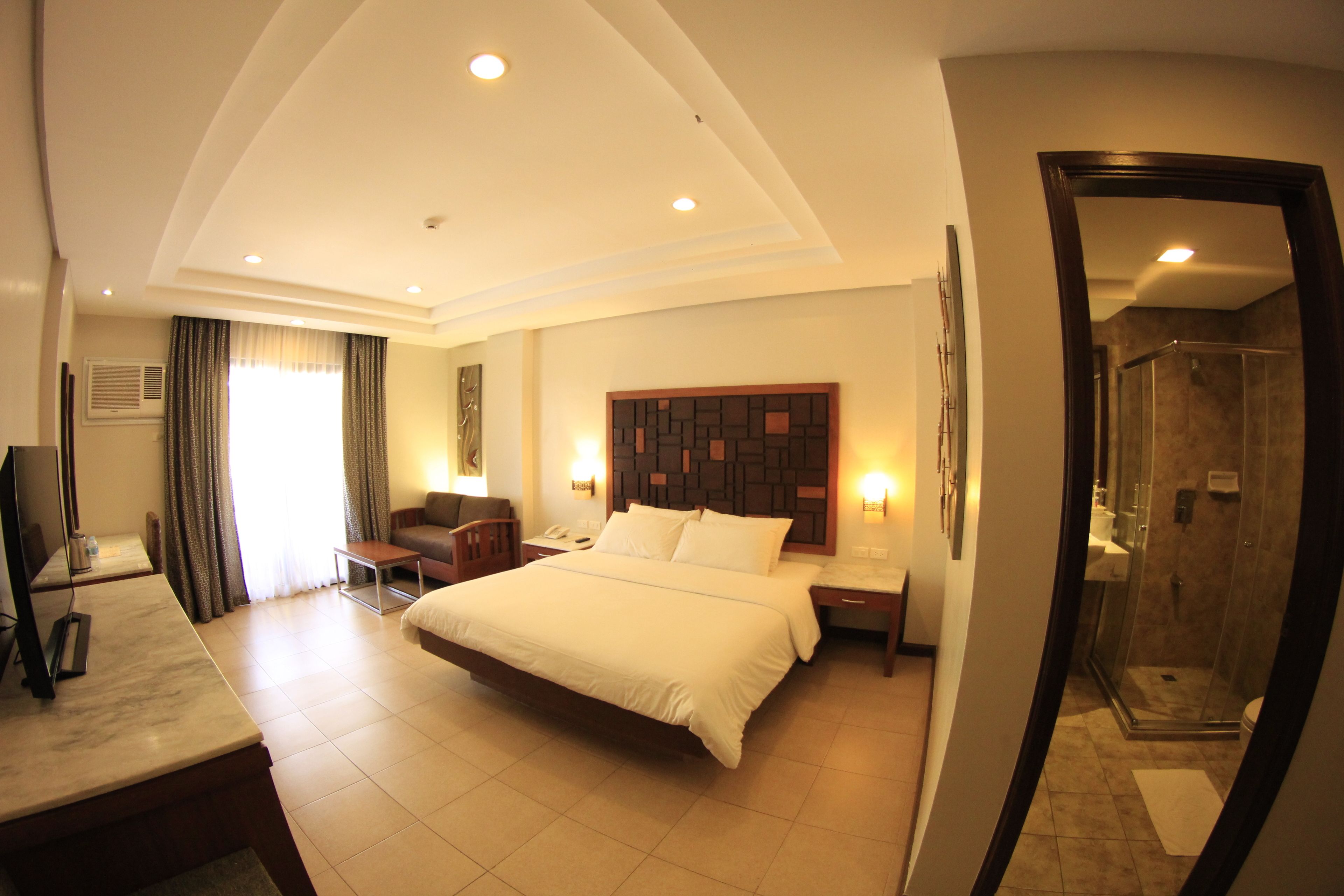 deluxe room, 1 bedroom, pool view | 1 bedroom, in-room safe, desk, blackout curtains