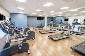 A gym with multiple treadmills, ellipticals, and stationary bikes. - Holiday Inn Express & Suites Indianapolis NE - Noblesville by IHG (Noblesville)