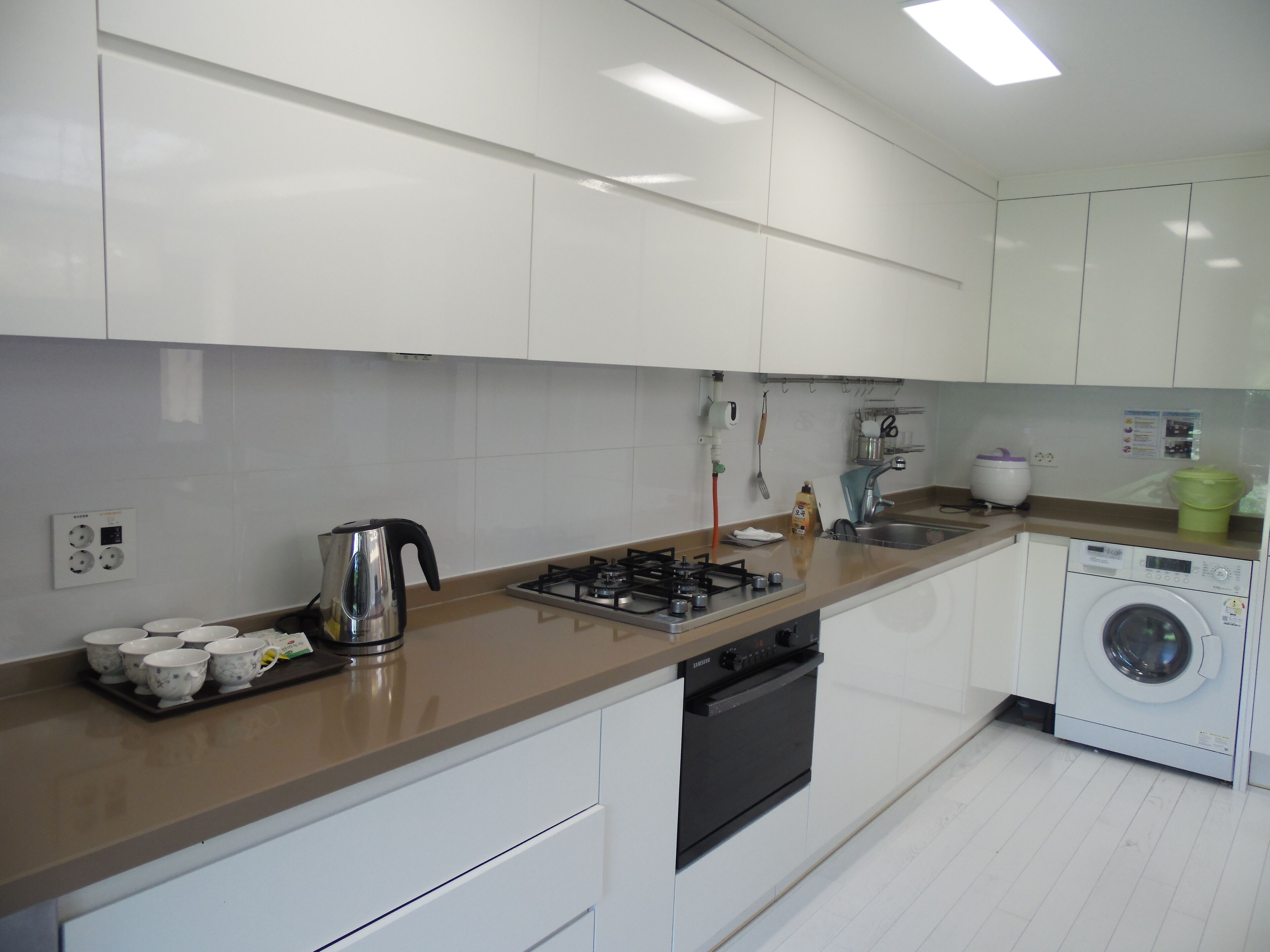 full-sized fridge, microwave, oven, electric kettle