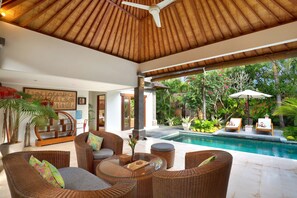 Two Bedroom Villa with Private Pool | Living area | 22-inch flat-screen TV with cable channels, TV, DVD player - The Buah Bali Villas (Seminyak)