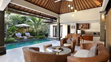 Two Bedroom Villa with Private Pool | Minibar, desk, blackout drapes, iron/ironing board