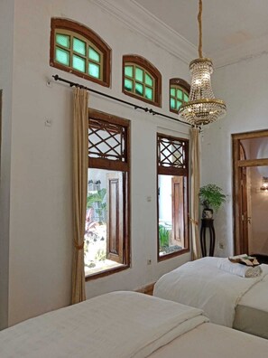 Habitación (Heritage Suites) | Ropa de cama 