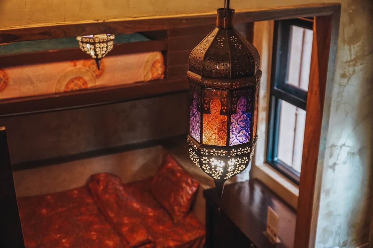 A traditional lantern with intricate patterns and a warm glow.