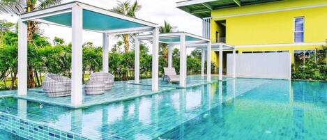 Outdoor pool, pool umbrellas, pool loungers