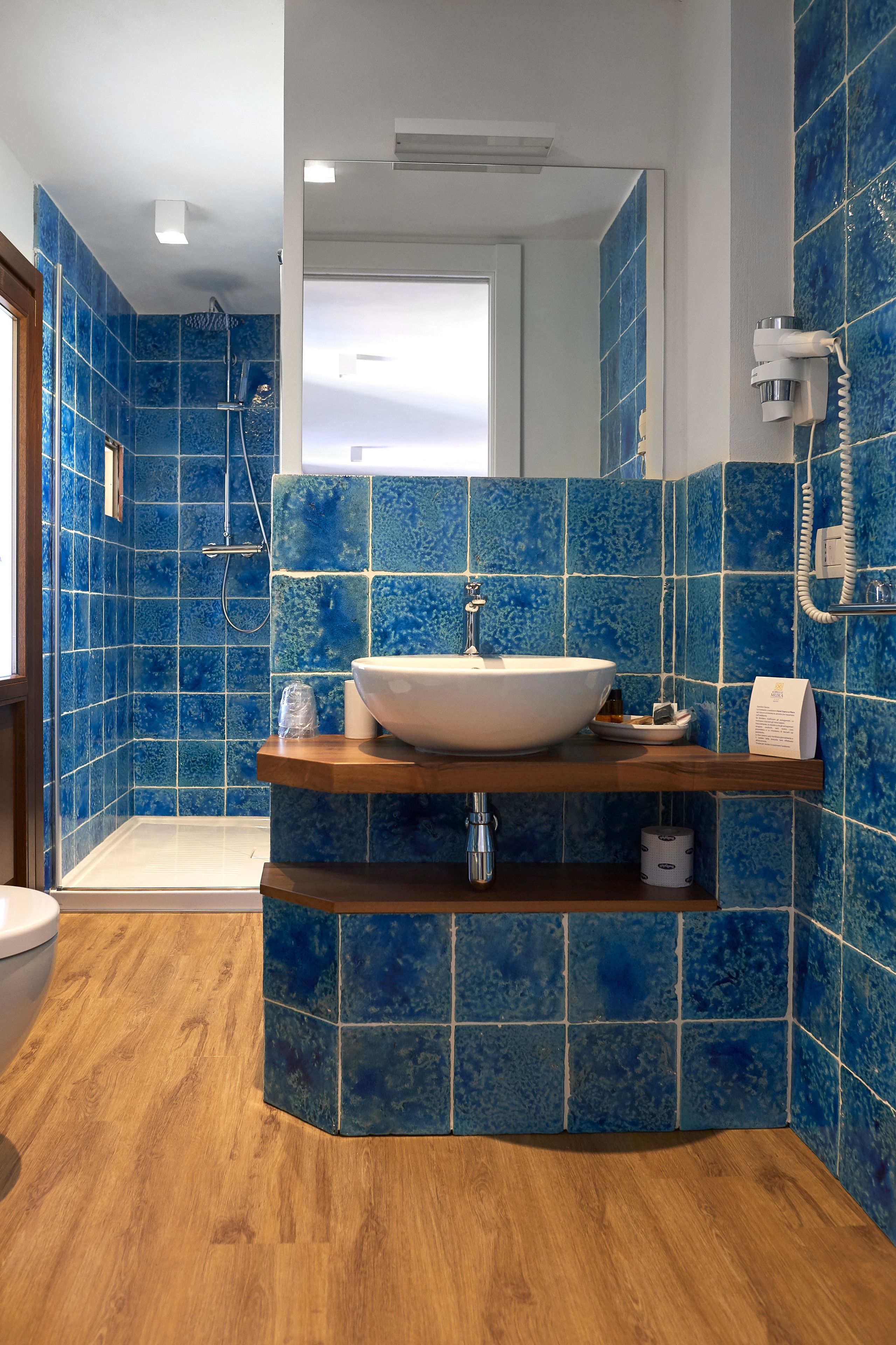 superior double room, sea view | bathroom | shower, free toiletries, hair dryer, towels