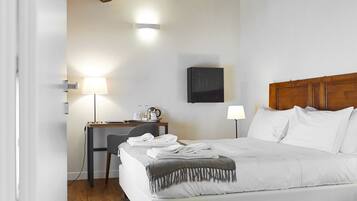 Premium bedding, down comforters, minibar, in-room safe