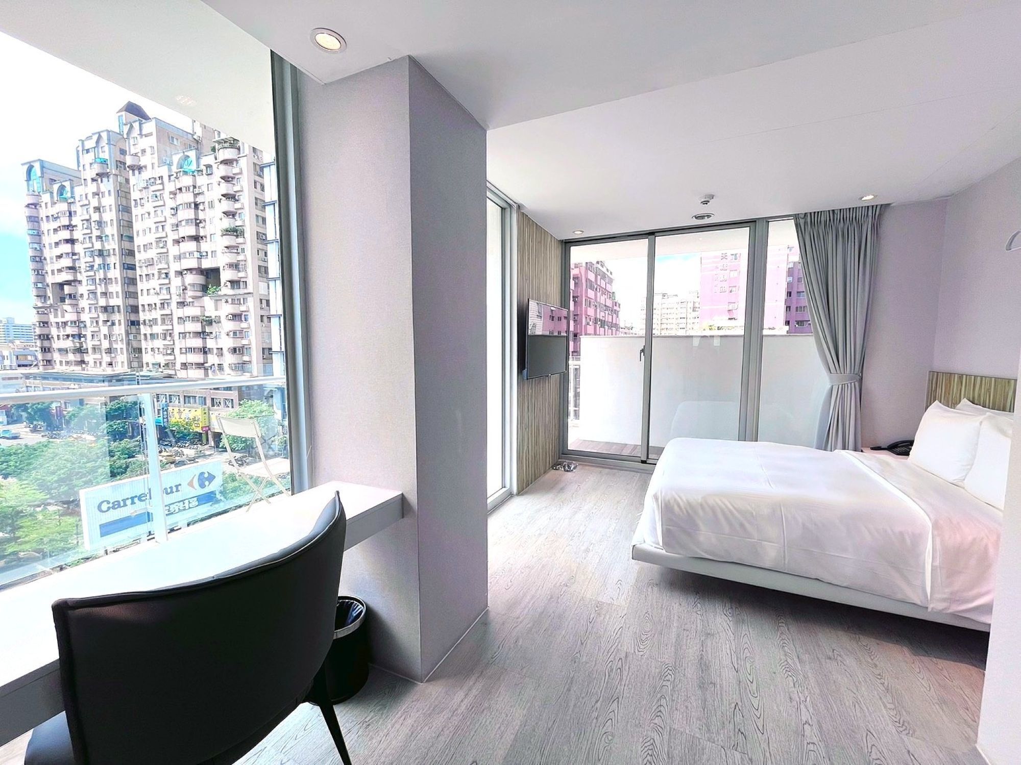 Balcony Deluxe Double Room | Premium bedding, down comforters, desk, soundproofing