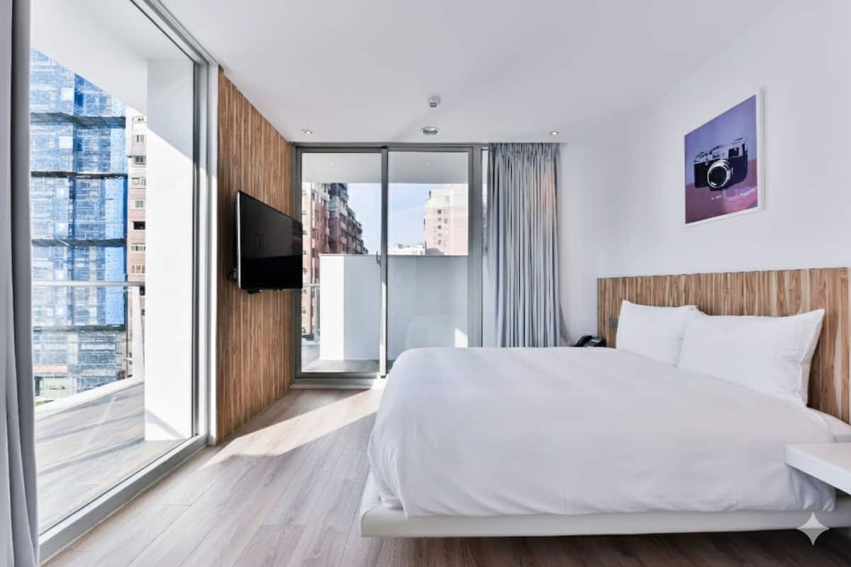 Balcony Deluxe Double Room | Premium bedding, down duvets, desk, soundproofing