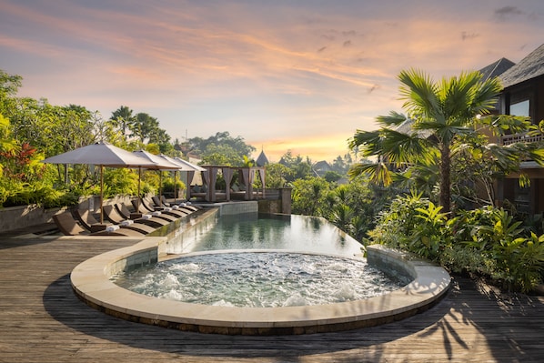 Outdoor pool, free pool cabanas, pool umbrellas