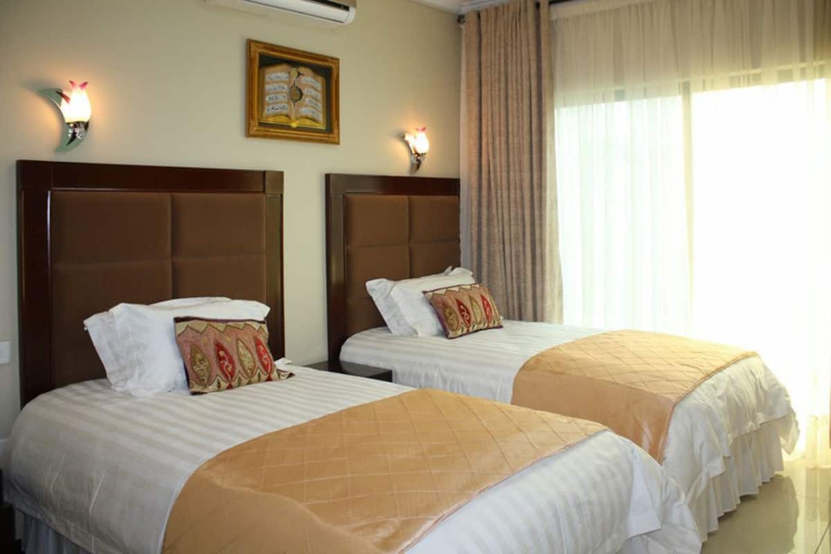 Executive Apartment, 1 Bedroom | 1 bedroom, desk, iron/ironing board, free WiFi
