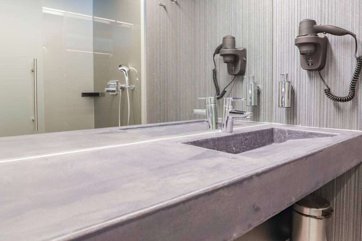 eco-friendly toiletries, hair dryer, towels, soap