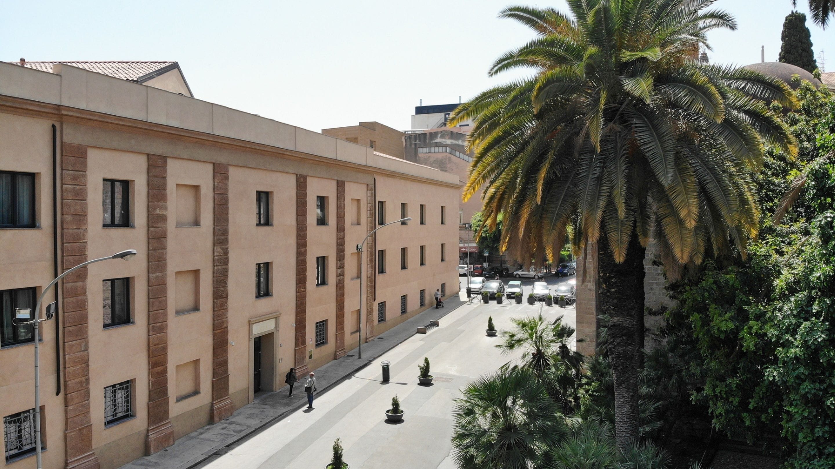 A building with a symmetrical facade, multiple windows, and a central entrance.