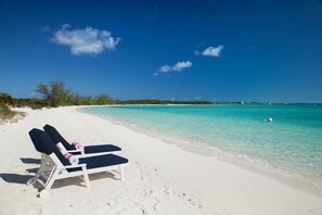 Private beach, white sand, free beach cabanas, sun loungers