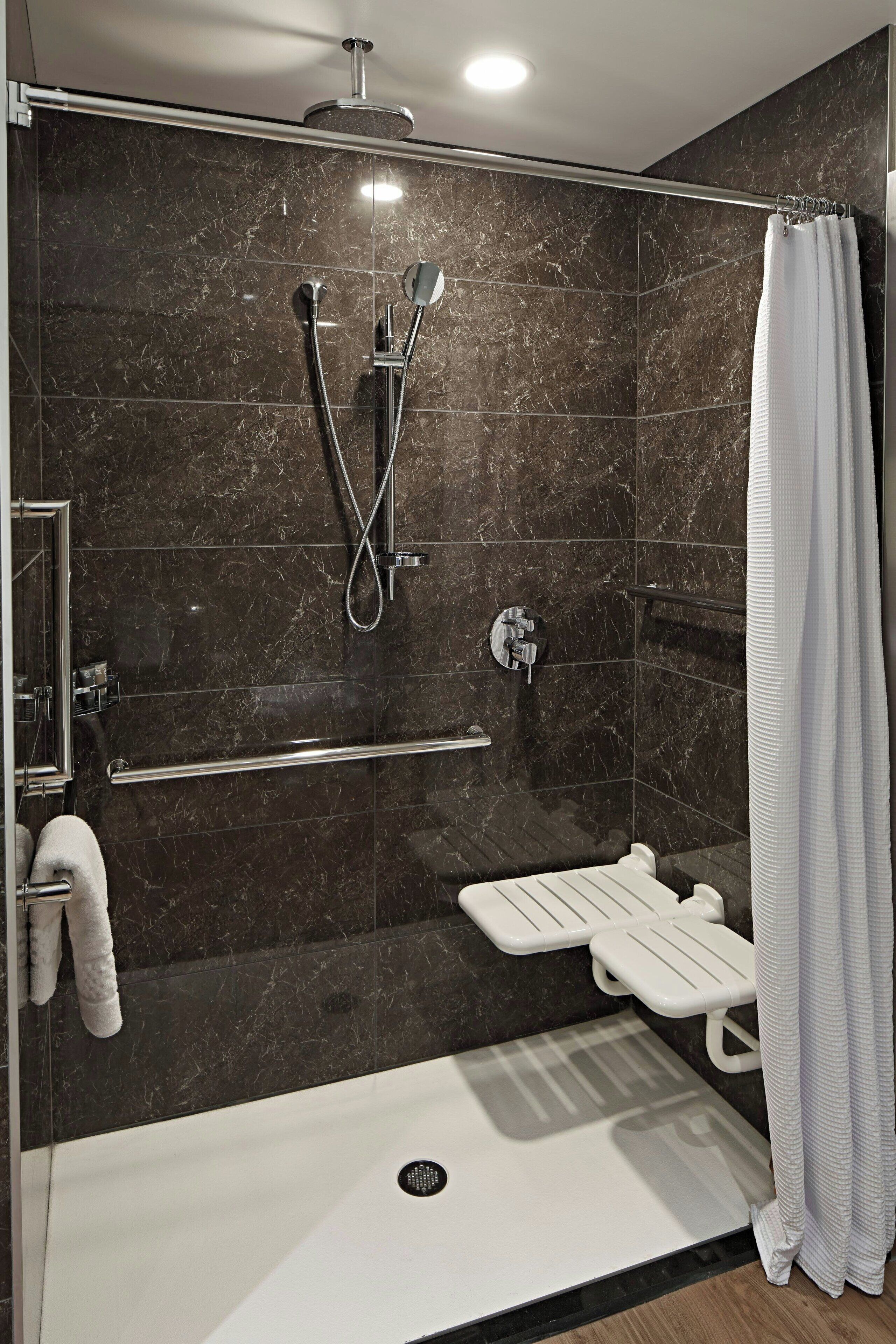 rainfall showerhead, hair dryer, towels
