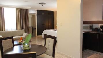 Junior Suite | Living area | 32-inch plasma TV with cable channels, TV