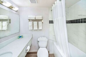 Suite, 1 Queen Bed, Non Smoking (Efficiency, Upgrade) | Bathroom | Combined shower/tub, rainfall showerhead, hair dryer, towels