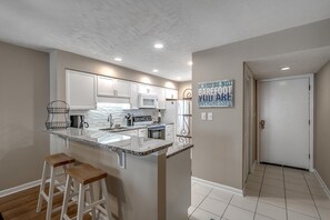 Condo, 1 King Bed (Anchorage I A05) | Private kitchen | Fridge, microwave, coffee/tea maker