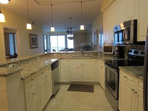 Apartment, 3 Bedrooms, Beachfront | Private kitchen | Fridge, microwave, coffee/tea maker, cookware/dishes/utensils