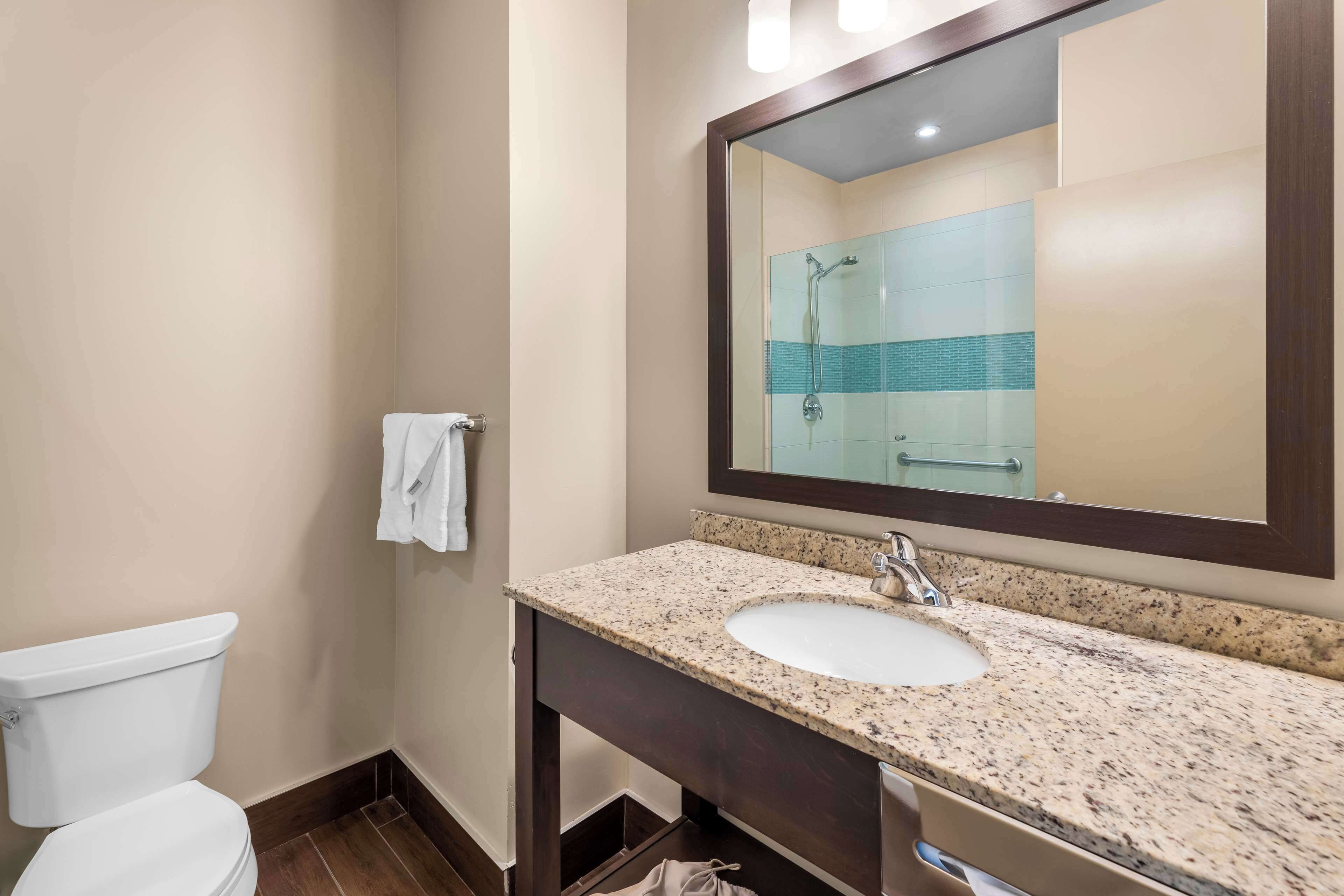 standard room, 2 queen beds, non smoking, refrigerator | bathroom | free toiletries, hair dryer, towels