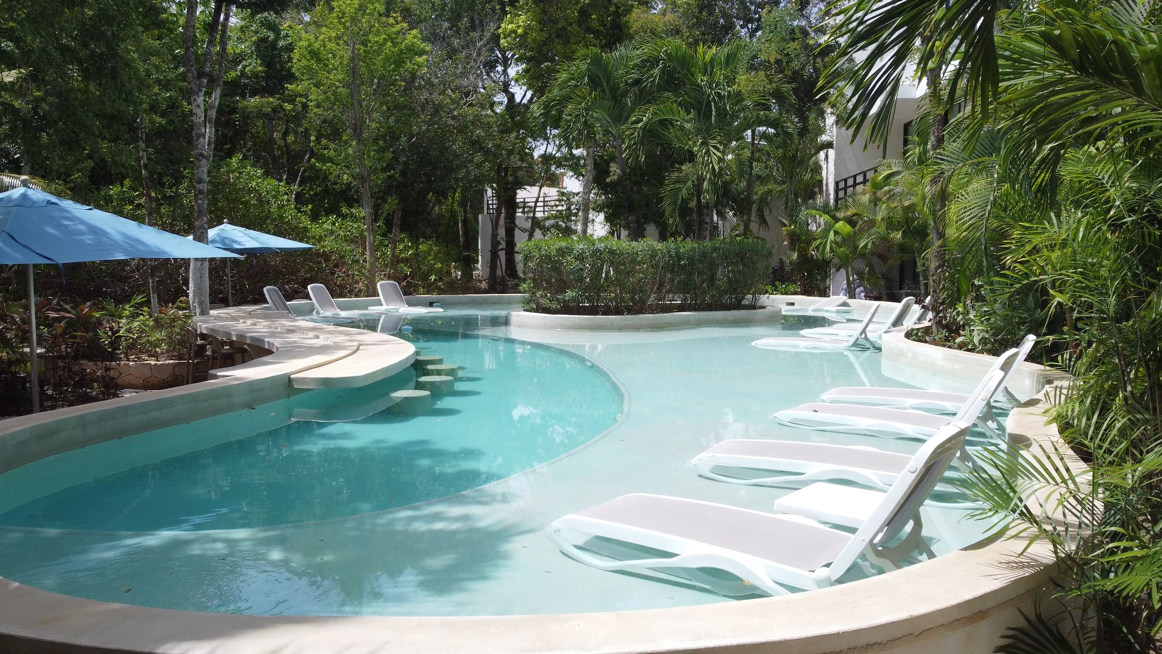 2 outdoor pools, pool umbrellas, sun loungers