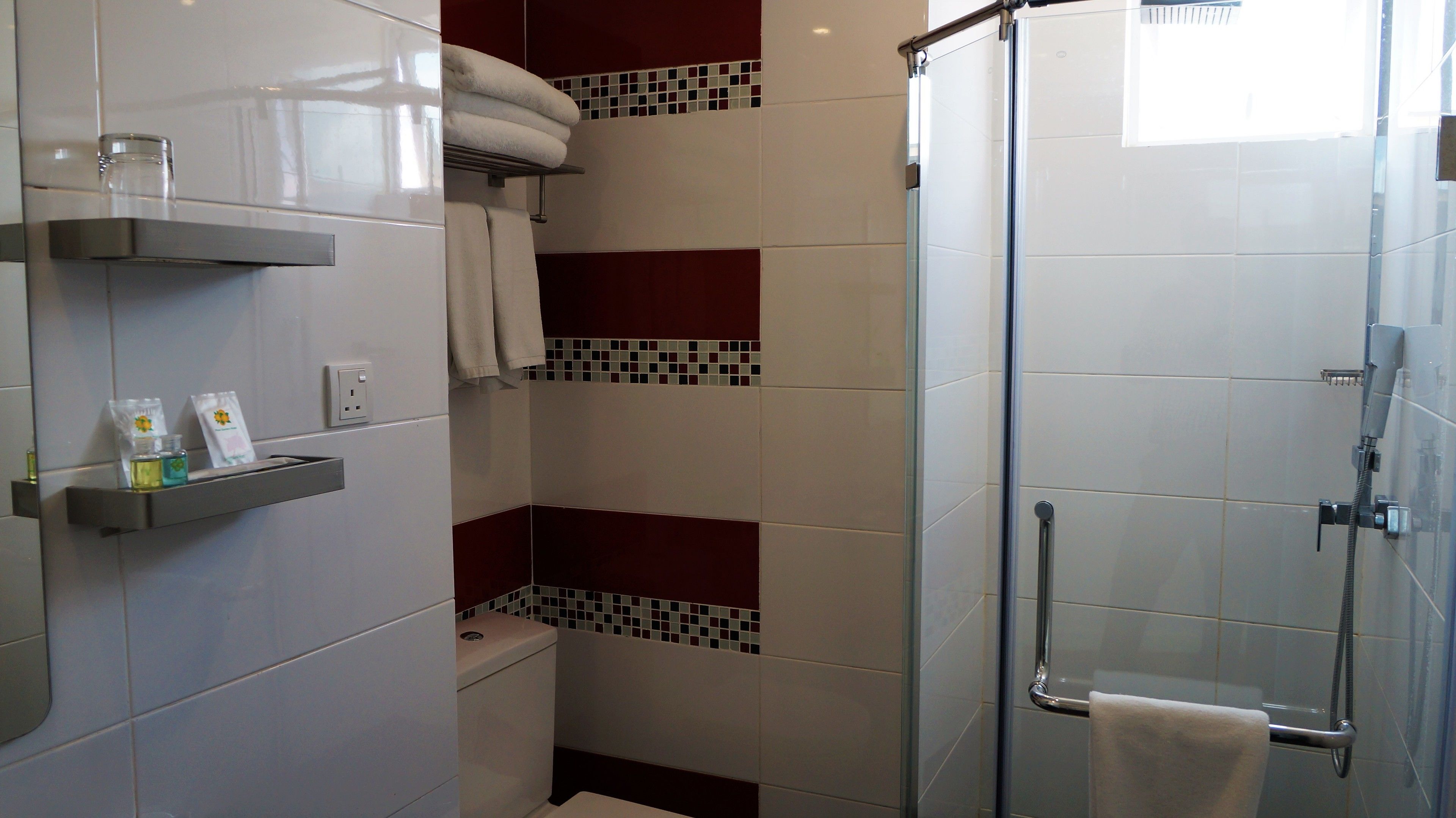 shower, free toiletries, hair dryer, towels