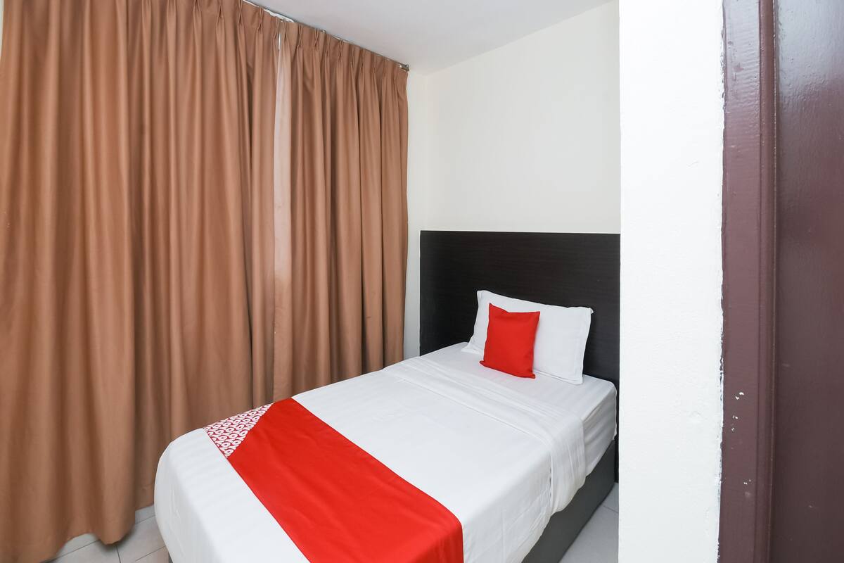Habitación individual Deluxe | Escritorio y wifi gratis