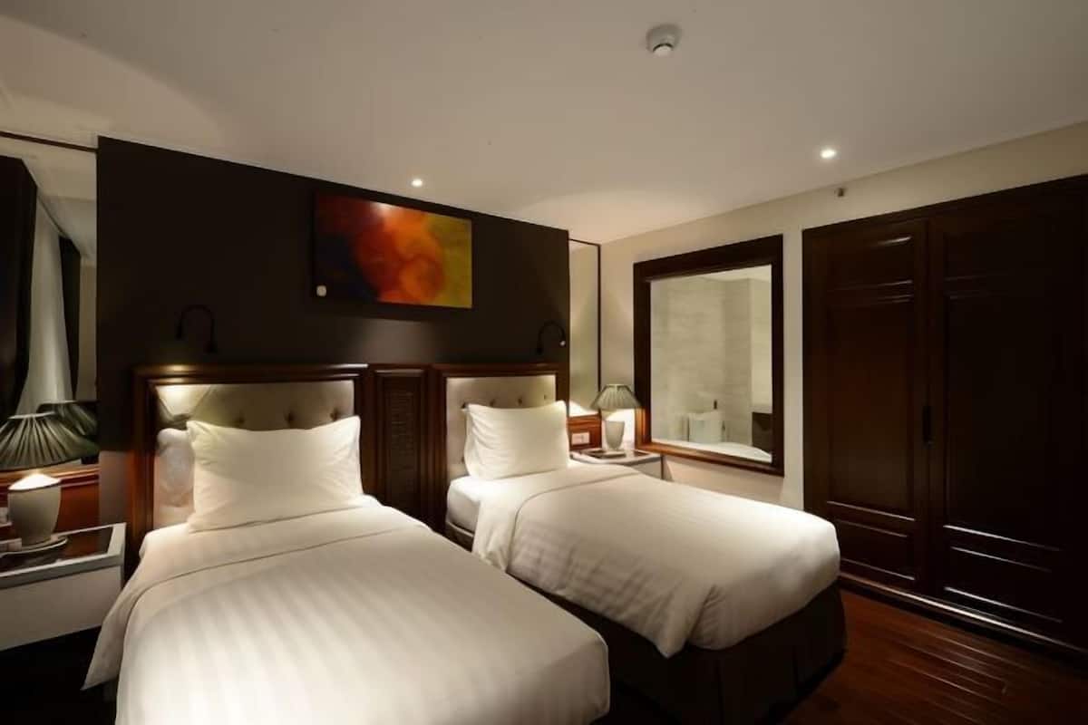 Ropa de cama de alta calidad, minibar, caja fuerte y escritorio