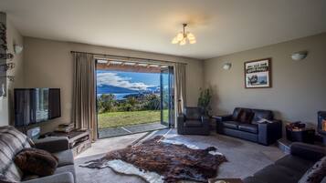 32-inch flat-screen TV with satellite channels, TV