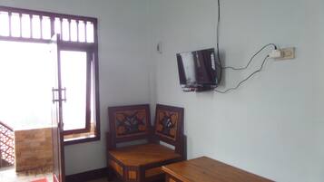 Double Room, Private Bathroom | Living area | LCD TV