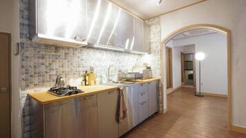 Suite Room | Private kitchenette | Shared fridge, microwave
