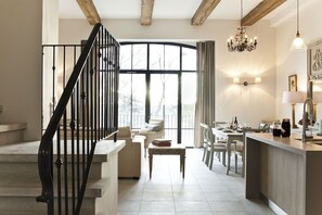 La Maison du Marechal Ferrant | Living room | Flat-screen TV, iPod dock