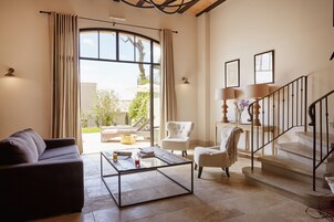 La Distillerie | Living area | Flat-screen TV, iPod dock