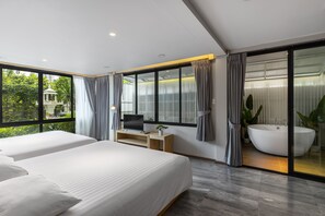 Quarto quádruplo família, 1 quarto, para não fumantes, no piso térreo | Vista para o jardim