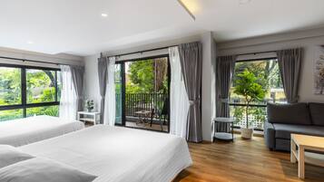 Premium bedding, blackout curtains, iron/ironing board, free WiFi